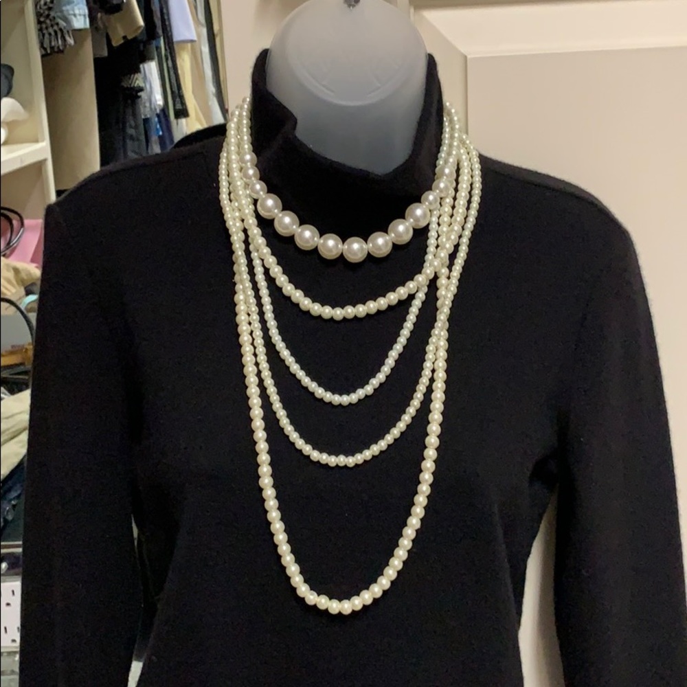 Five strand Pearl necklace.